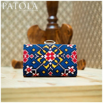 Double Ikkat Patola Clutch Nau Ratan